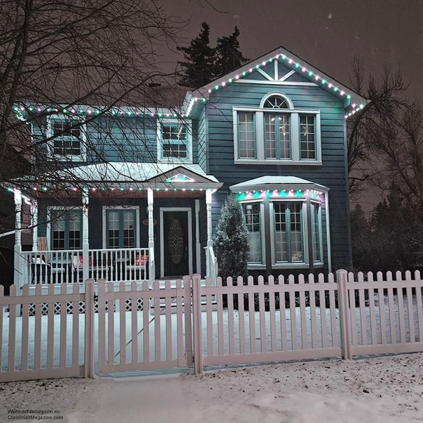 the pretty blue house with white picket fence